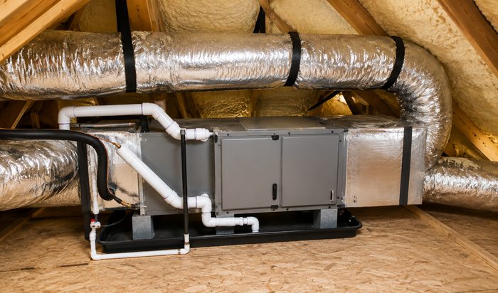 AC air handler unit installed in a home attic