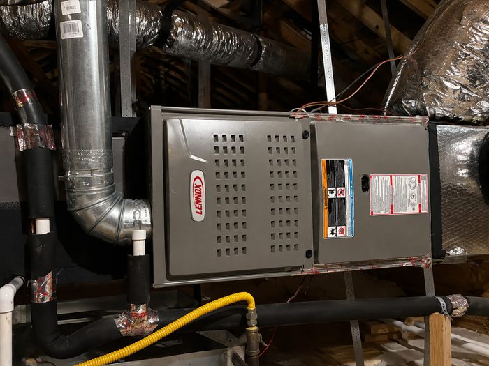 Newly installed furnace unit in a home attic